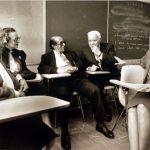Former students reminisce in Dr. McAllister's classroom at Miner Teachers College