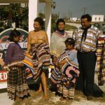Seminole Family Selling Patchwork Clothing by Lake Okeechobee, FL.